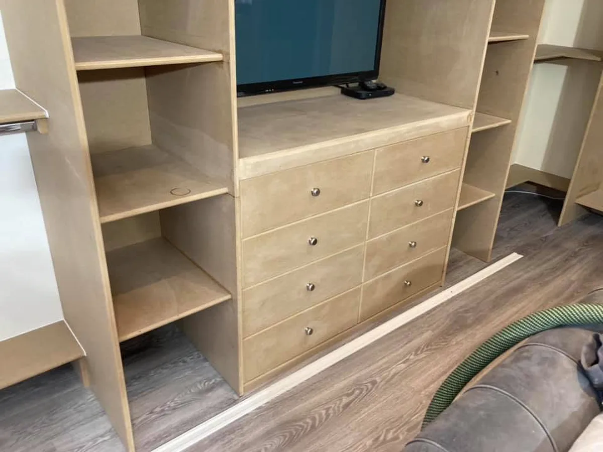 Custom fitted media unit and storage
